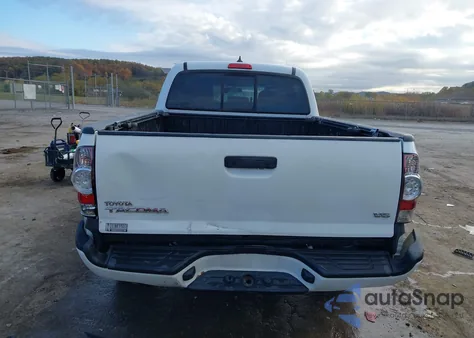 2015 Toyota Tacoma Base V6 z USA, uszkodzony, nr VIN 3TMMU4FN0FM082575